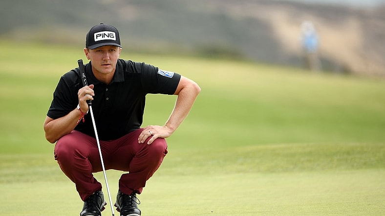 Jun 19, 2021; San Diego, California, USA; Mackenzie Hughes lines up a putt on the fourth green during the third round of the U.S. Open golf tournament at Torrey Pines Golf Course. Mandatory Credit: Orlando Ramirez-USA TODAY Sports