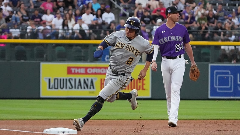 Jun 19, 2021; Denver, Colorado, USA; Milwaukee Brewers third baseman Luis Urias (2) heads home to score against the Colorado Rockies in the first inning at Coors Field. Mandatory Credit: Ron Chenoy-USA TODAY Sports