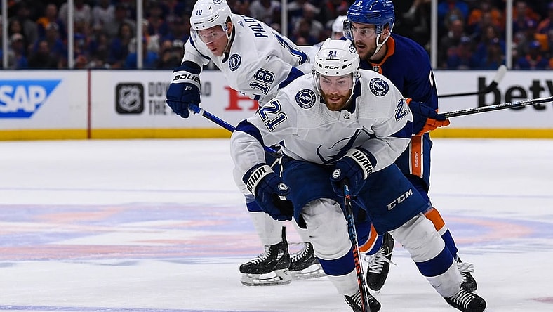 Jun 19, 2021; Uniondale, New York, USA; Tampa Bay Lightning center Brayden Point (21) skates across the blue line against the New York Islanders during the third period in game four of the 2021 Stanley Cup Semifinals at Nassau Veterans Memorial Coliseum. Mandatory Credit: Dennis Schneidler-USA TODAY Sports