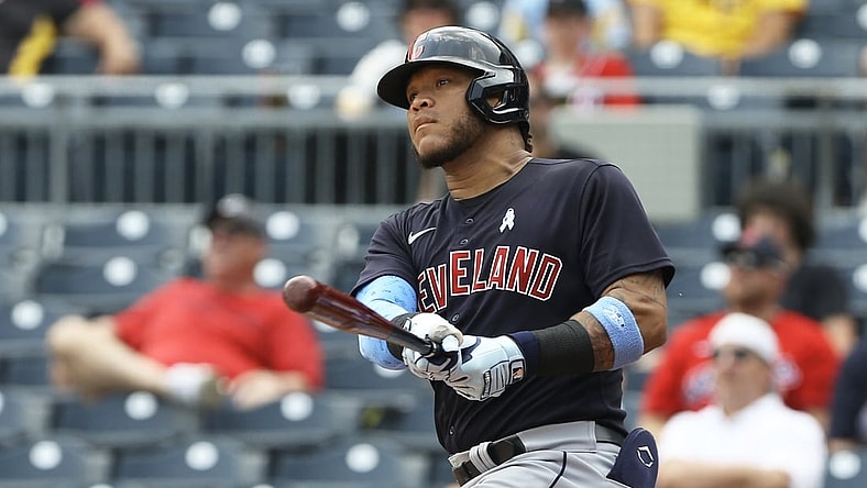 Jun 20, 2021; Pittsburgh, Pennsylvania, USA; Cleveland Indians center fielder Harold Ramirez (40) hits a solo home run against the Pittsburgh Pirates during the fifth inning at PNC Park. Mandatory Credit: Charles LeClaire-USA TODAY Sports