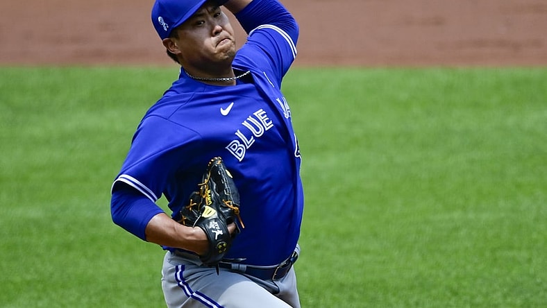 Jun 20, 2021; Baltimore, Maryland, USA; Toronto Blue Jays starting pitcher Hyun Jin Ryu (99) throws a pitch during the fourth inning against the Baltimore Orioles  at Oriole Park at Camden Yards. Mandatory Credit: Tommy Gilligan-USA TODAY Sports