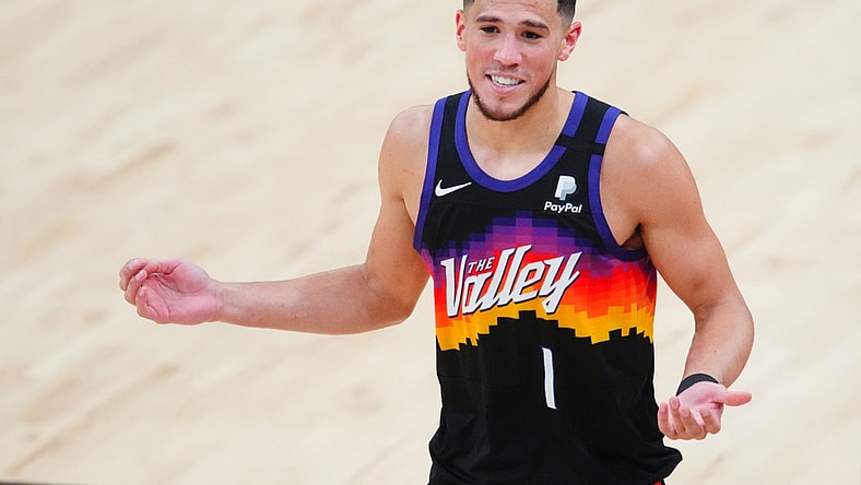 Jun 20, 2021; Phoenix, Arizona, USA; Phoenix Suns guard Devin Booker reacts against the Los Angeles Clippers in the second half during game one of the Western Conference Finals for the 2021 NBA Playoffs at Phoenix Suns Arena. Mandatory Credit: Mark J. Rebilas-USA TODAY Sports