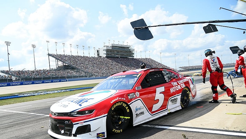 Jun 20, 2021; Nashville, Tennessee, USA; NASCAR Cup Series driver Kyle Larson (5) races out of a pit stop during the Ally 400 at Nashville Superspeedway. Mandatory Credit: Christopher Hanewinckel-USA TODAY Sports
