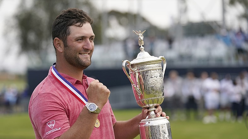 Jun 20, 2021; San Diego, California, USA; Jon Rahm celebrates with the trophy after winning he U.S. Open golf tournament at Torrey Pines Golf Course. Mandatory Credit: Michael Madrid-USA TODAY Sports