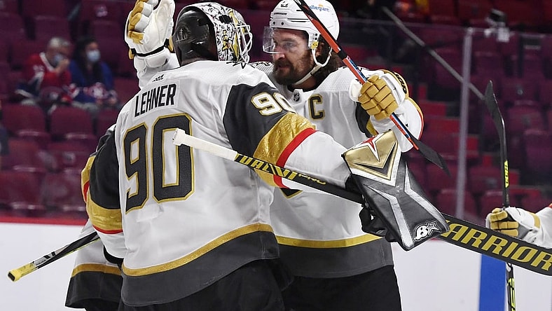 Jun 20, 2021; Montreal, Quebec, CAN; Vegas Golden Knights goalie Robin Lehner (90) and forward Mark Stone (61) celebrate the win against the Montreal Canadiens in game four of the 2021 Stanley Cup Semifinals at the Bell Centre. Mandatory Credit: Eric Bolte-USA TODAY Sports