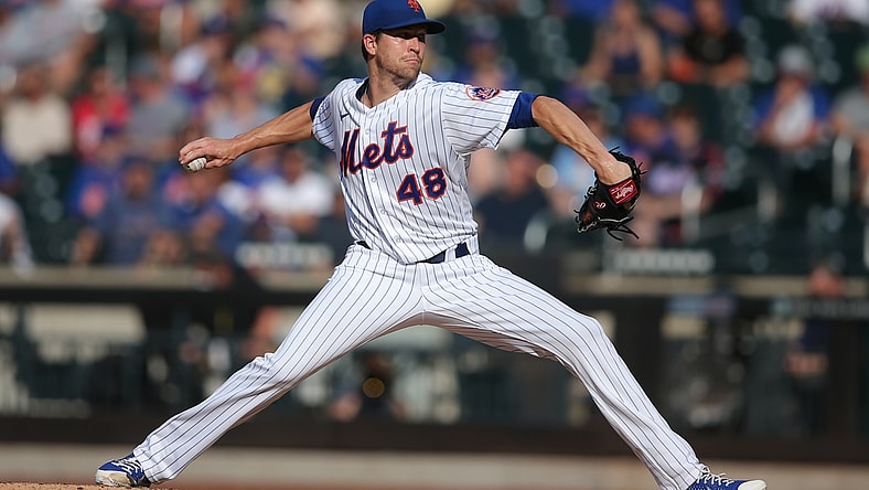 Jun 21, 2021; New York City, New York, USA; New York Mets starting pitcher Jacob deGrom (48) pitches against the Atlanta Braves during the third inning at Citi Field. Mandatory Credit: Brad Penner-USA TODAY Sports