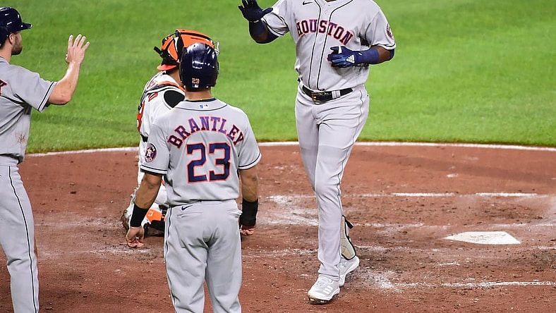 Jun 21, 2021; Baltimore, Maryland, USA; Houston Astros outfielder Yordan Alvarez (44) high fives teammates after hitting a home run in the third inning against the Baltimore Orioles at Oriole Park at Camden Yards. Mandatory Credit: Evan Habeeb-USA TODAY Sports