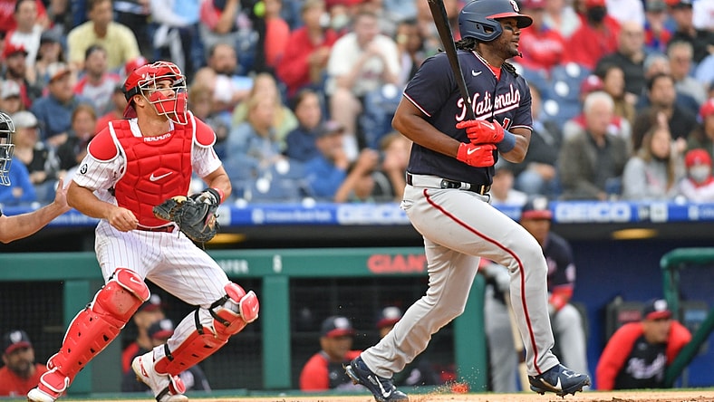 Jun 22, 2021; Philadelphia, Pennsylvania, USA; Washington Nationals first baseman Josh Bell (19) follows through on a swing for an RBI single during the first inning against the Philadelphia Phillies at Citizens Bank Park. Mandatory Credit: Eric Hartline-USA TODAY Sports