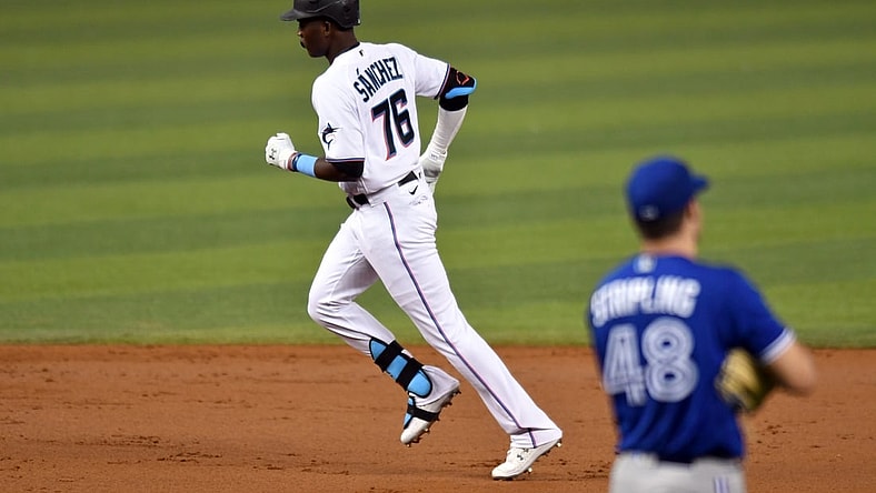 Jun 22, 2021; Miami, Florida, USA;  Miami Marlins outfielder Jesus Sanchez (76) rounds the bases after hitting a solo home run off of Toronto Blue Jays pitcher Ross Stripling (48) in the second inning at loanDepot Park. Mandatory Credit: Jim Rassol-USA TODAY Sports