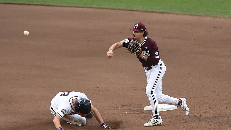 Jun 22, 2021; Omaha, Nebraska, USA; Mississippi State Bulldogs infielder Lane Forsythe (43) completes a double play in the fourth inning against the Virginia Cavaliers at TD Ameritrade Park. Mandatory Credit: Steven Branscombe-USA TODAY Sports
