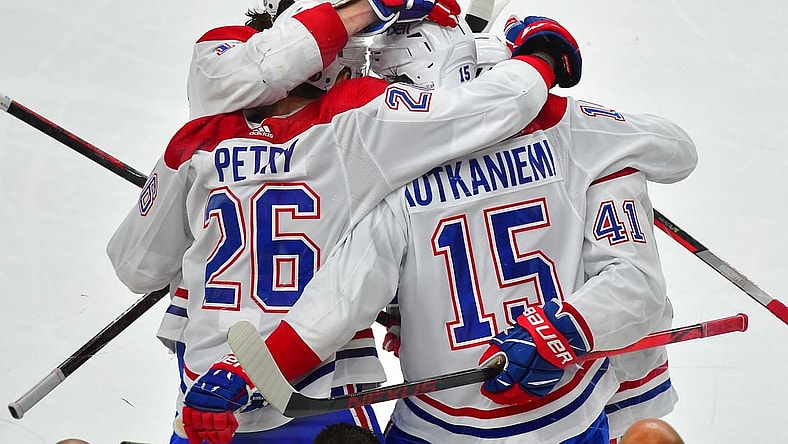 Jun 22, 2021; Las Vegas, Nevada, USA; Montreal Canadiens center Jesperi Kotkaniemi (15) celebrates with teammates after scoring a first period goal against the Vegas Golden Knights in game five of the 2021 Stanley Cup Semifinals at T-Mobile Arena. Mandatory Credit: Stephen R. Sylvanie-USA TODAY Sports