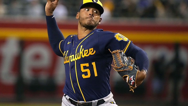 Jun 22, 2021; Phoenix, Arizona, USA; Milwaukee Brewers pitcher Freddy Peralta (51) throws a pitch against the Arizona Diamondbacks in the first inning at Chase Field. Mandatory Credit: Rick Scuteri-USA TODAY Sports