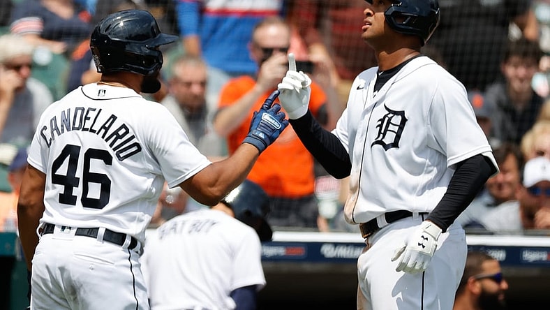 Jun 23, 2021; Detroit, Michigan, USA;  Detroit Tigers first baseman Jonathan Schoop (7) receives congratulations from third baseman Jeimer Candelario (46) after he hits a home run in the fifth inning against the St. Louis Cardinals at Comerica Park. Mandatory Credit: Rick Osentoski-USA TODAY Sports