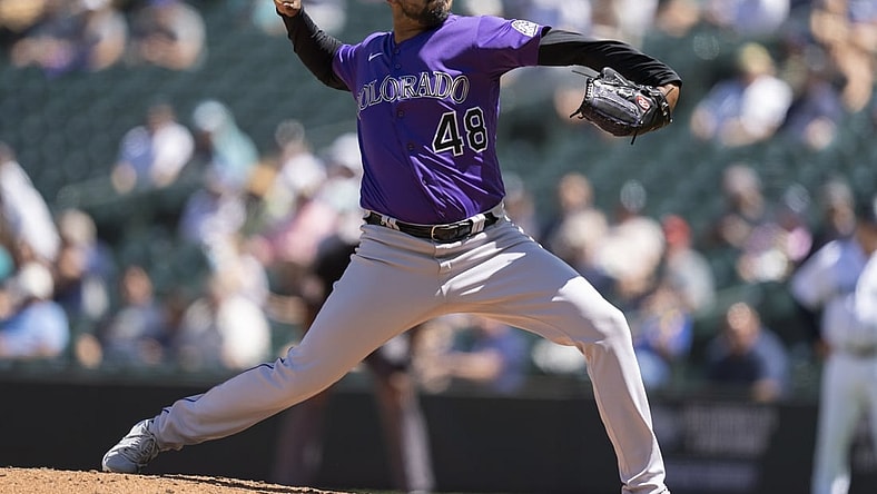 Jun 23, 2021; Seattle, Washington, USA;  Colorado Rockies starter German Marquez (48) delivers a pitch during the fourth inning of a game against the Seattle Mariners at T-Mobile Park. Mandatory Credit: Stephen Brashear-USA TODAY Sports