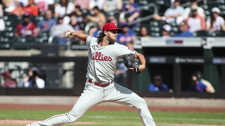 Jun 25, 2021; New York City, New York, USA;  Philadelphia Phillies pitcher Aaron Nola (27) pitches in the first inning against the New York Mets at Citi Field. Mandatory Credit: Wendell Cruz-USA TODAY Sports