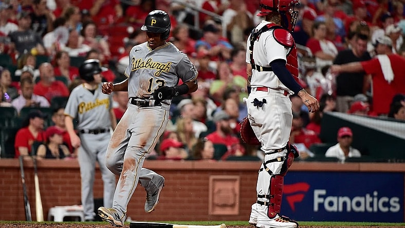 Jun 25, 2021; St. Louis, Missouri, USA;  Pittsburgh Pirates third baseman Ke'Bryan Hayes (13) scores on a single by catcher Jacob Stallings (not pictured) during the fifth inning against the St. Louis Cardinals at Busch Stadium. Mandatory Credit: Jeff Curry-USA TODAY Sports