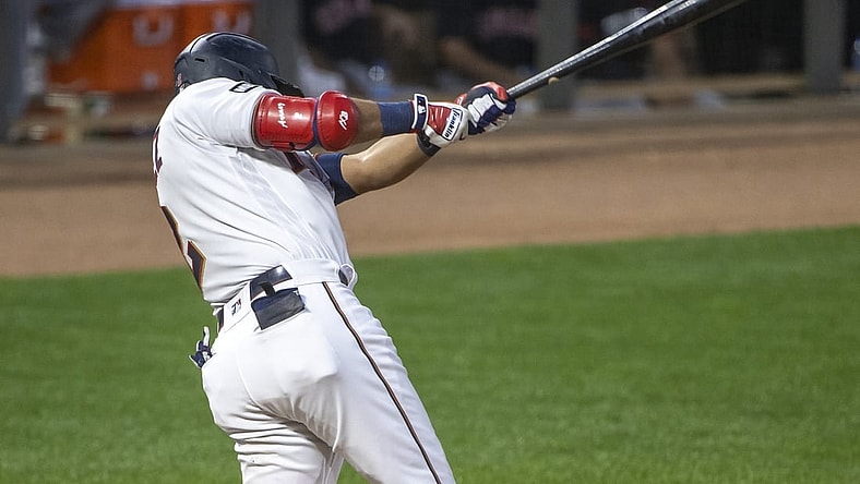 Jun 25, 2021; Minneapolis, Minnesota, USA; Minnesota Twins left fielder Luis Arraez (2) hits a two-run double in the sixth inning against the Cleveland Indians at Target Field. Mandatory Credit: Jesse Johnson-USA TODAY Sports