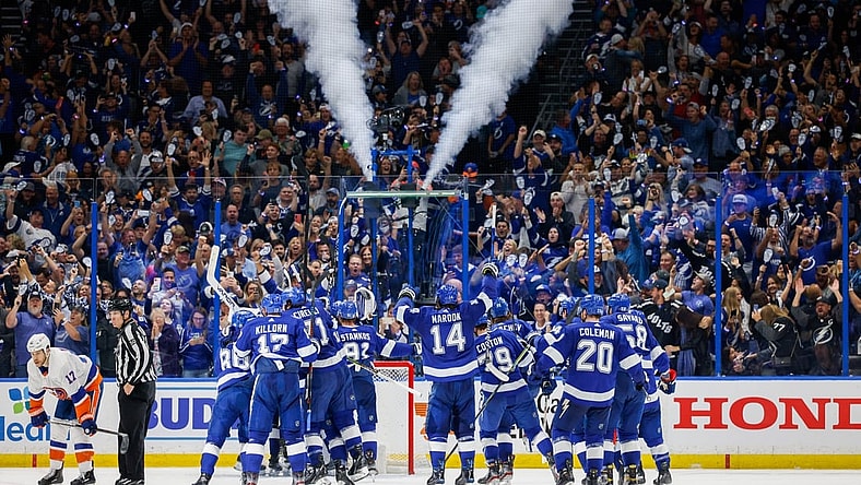 Jun 25, 2021; Tampa, Florida, USA; Tampa Bay Lightning celebrate after beating the New York Islanders 1-0 in game seven of the Stanley Cup Semifinals at Amalie Arena. Mandatory Credit: Nathan Ray Seebeck-USA TODAY Sports