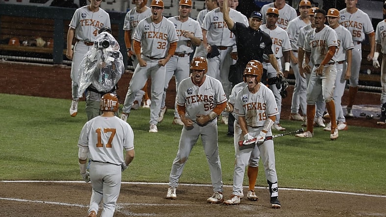 Jun 25, 2021; Omaha, Nebraska, USA;  Texas Longhorns designated hitter Ivan Melendez (17) scores after hitting a three-run home run against the Mississippi State Bulldogs at TD Ameritrade Park. Mandatory Credit: Bruce Thorson-USA TODAY Sports
