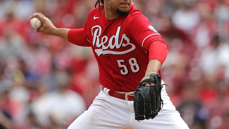 Jun 26, 2021; Cincinnati, Ohio, USA; Cincinnati Reds starting pitcher Luis Castillo (58) throws a pitch against the Atlanta Braves during the first inning at Great American Ball Park. Mandatory Credit: David Kohl-USA TODAY Sports