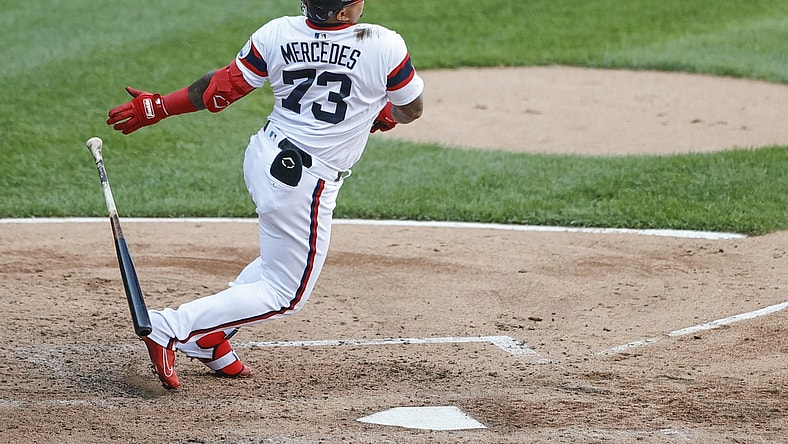 Jun 27, 2021; Chicago, Illinois, USA; Chicago White Sox catcher Yermin Mercedes (73) hits an RBI single against the Seattle Mariners during the fourth inning of the second game of a doubleheader at Guaranteed Rate Field. Mandatory Credit: Kamil Krzaczynski-USA TODAY Sports
