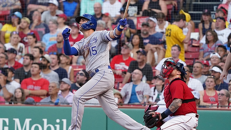 Jun 28, 2021; Boston, Massachusetts, USA; Kansas City Royals right fielder Whit Merrifield (15) hits a home run against the Boston Red Sox during the second inning at Fenway Park. Mandatory Credit: David Butler II-USA TODAY Sports
