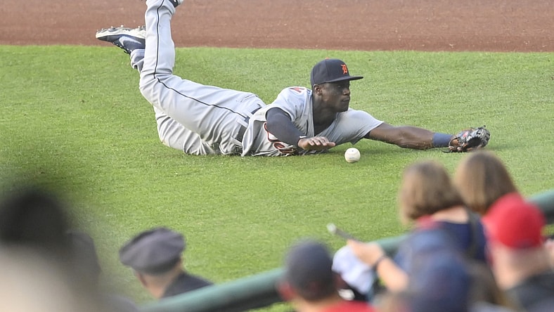 Jun 28, 2021; Cleveland, Ohio, USA; Detroit Tigers right fielder Daz Cameron (41) dives for a double by Cleveland Indians right fielder Harold Ramirez (40) in the second inning at Progressive Field. Mandatory Credit: David Richard-USA TODAY Sports