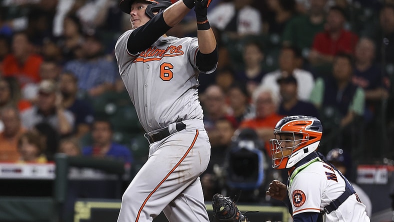 Jun 28, 2021; Houston, Texas, USA; Baltimore Orioles first baseman Ryan Mountcastle (6) hits an RBI single during the third inning against the Houston Astros at Minute Maid Park. Mandatory Credit: Troy Taormina-USA TODAY Sports
