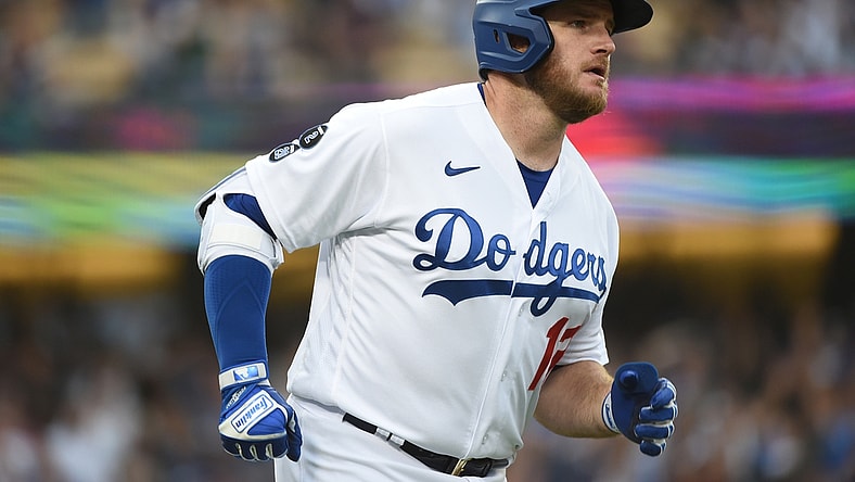 Jun 28, 2021; Los Angeles, California, USA; Los Angeles Dodgers first baseman Max Muncy (13) runs after hitting a solo home run in the first inning against the San Francisco Giants at Dodger Stadium. Mandatory Credit: Richard Mackson-USA TODAY Sports