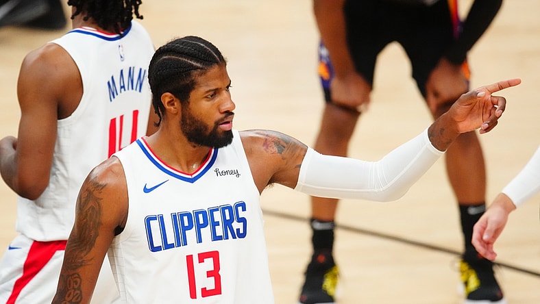 Jun 28, 2021; Phoenix, Arizona, USA; Los Angeles Clippers guard Paul George (13) against the Phoenix Suns in the first half during game five of the Western Conference Finals for the 2021 NBA Playoffs at Phoenix Suns Arena. Mandatory Credit: Mark J. Rebilas-USA TODAY Sports