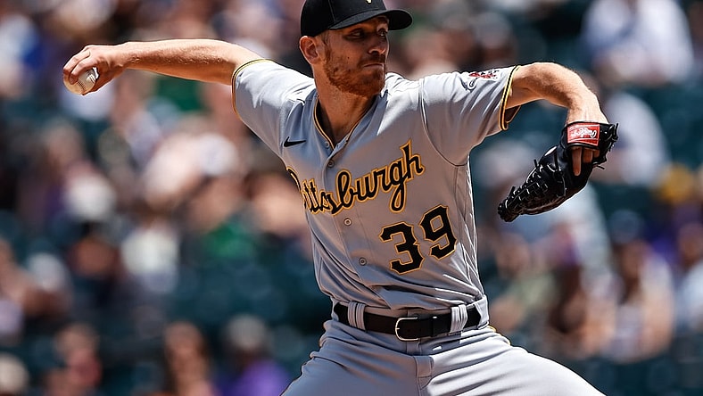 Jun 30, 2021; Denver, Colorado, USA; Pittsburgh Pirates starting pitcher Chad Kuhl (39) pitches in the first inning against the Colorado Rockies at Coors Field. Mandatory Credit: Isaiah J. Downing-USA TODAY Sports