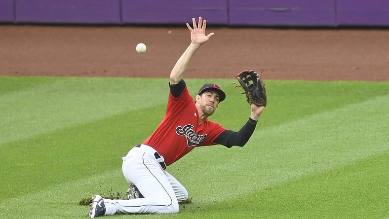 Jun 30, 2021; Cleveland, Ohio, USA; Cleveland Indians center fielder Bradley Zimmer (4) attempts to field a single hit by Detroit Tigers designated hitter Miguel Cabrera (not pictured) during the third inning at Progressive Field. Mandatory Credit: David Richard-USA TODAY Sports