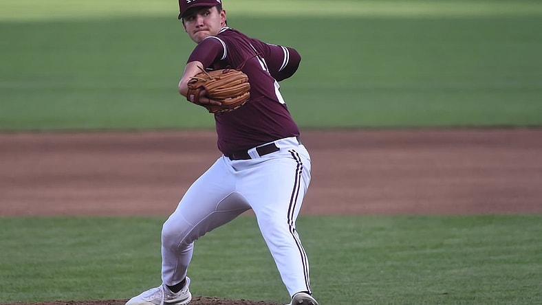 Jun 30, 2021; Omaha, Nebraska, USA;  Mississippi St. Bulldogs pitcher Will Bednar (24) pitches in the fourth inning against the Vanderbilt Commodores at TD Ameritrade Park. Mandatory Credit: Steven Branscombe-USA TODAY Sports