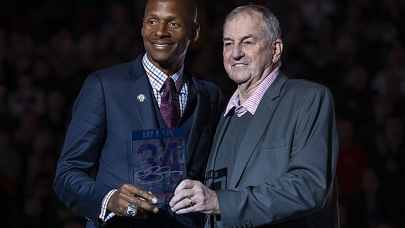 Mar 3, 2019; Storrs, CT, USA; Former Connecticut Huskies head coach Jim Calhoun (right) helps honor former Connecticut Huskies and Naismith Memorial Basketball Hall of Fame inductee Ray Allen with the retirement of his jersey number (34) during half time as the Huskies take on the South Florida Bulls at Gampel Pavilion. Allen is the second UConn player to have their number retired. Mandatory Credit: David Butler II-USA TODAY Sports