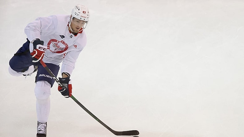 Jul 14, 2020; Arlington, Virginia, USA; Washington Capitals left wing Beck Malenstyn (47) shoots the puck during an NHL workout at MedStar Capitals Iceplex. Mandatory Credit: Geoff Burke-USA TODAY Sports