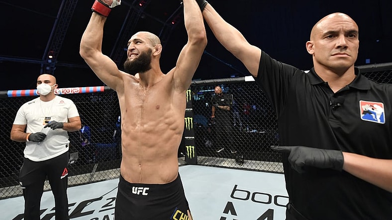 July 26, 2020; Abu Dhabi, UAE; Khamzat Chimaev (red gloves) of Czechia celebrates after his TKO victory over Rhys McKee (not pictured) of Northern Ireland in their welterweight fight during the UFC Fight Night event inside Flash Forum on UFC Fight Island .  Mandatory Credit: Jeff Bottari/Zuffa LLC via USA TODAY Sports