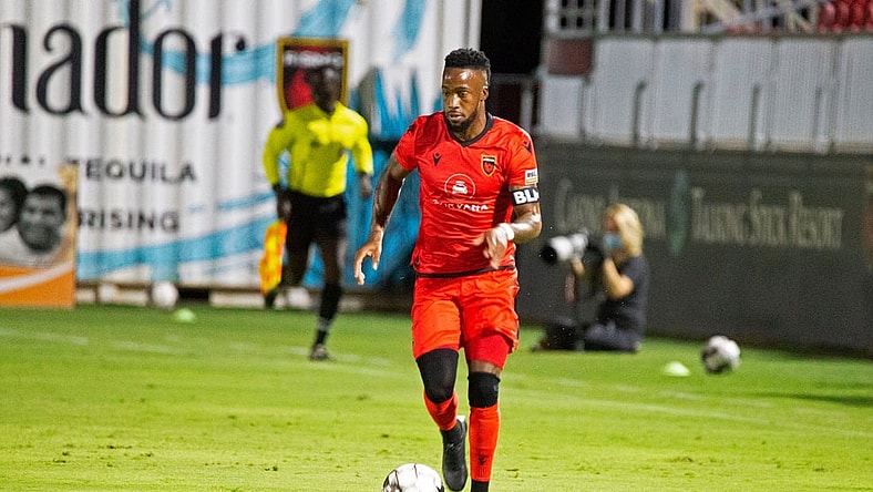 August 8, 2020; Tempe AZ, USA; Forward Junior Flemmings dribbles down the sideline unchallenged. Flemmings enters halftime with one goal against New Mexico United. Mandatory Credit: Justin Toumberlin/The Arizona Republic via USA TODAY NETWORK

Phoenix Rising Fc Faces Off Against New Mexico United