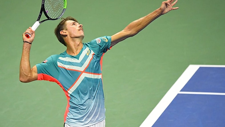 Sep 9, 2020; Flushing Meadows, New York,USA; Alex de Minaur of Australia serves against Dominic Thiem of Austria (not pictured) in a men's singles quarter-finals match on day nine of the 2020 U.S. Open tennis tournament at USTA Billie Jean King National Tennis Center. Mandatory Credit: Robert Deutsch-USA TODAY Sports