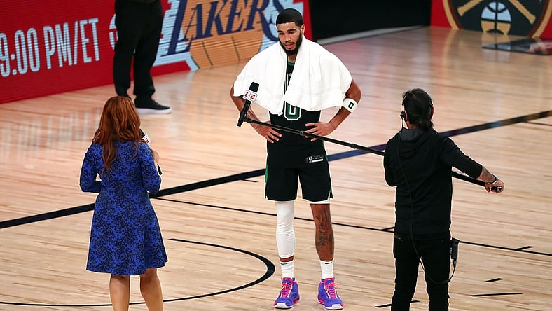 Sep 25, 2020; Lake Buena Vista, Florida, USA; Boston Celtics forward Jayson Tatum (0) is interviewed by sideline reporter Rachel Nichols following game five of the Eastern Conference Finals of the 2020 NBA Playoffs at AdventHealth Arena. Mandatory Credit: Kim Klement-USA TODAY Sports