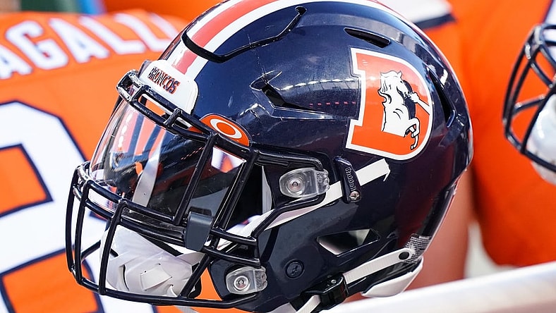 Dec 19, 2020; Denver, Colorado, USA; A general view of the Denver Broncos helmet on sidelines against the Buffalo Bills during the second quarter at Empower Field at Mile High. Mandatory Credit: Troy Babbitt-USA TODAY Sports