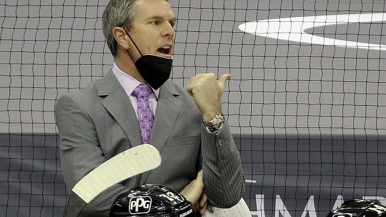 Mar 29, 2021; Pittsburgh, Pennsylvania, USA;  Pittsburgh Penguins head coach Mike Sullivan reacts on the bench against the New York Islanders during the third period at PPG Paints Arena. Pittsburgh won 2-1 Mandatory Credit: Charles LeClaire-USA TODAY Sports