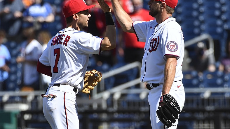 May 2, 2021; Washington, District of Columbia, USA; Washington Nationals starting pitcher Max Scherzer (31) is congratulated by shortstop Trea Turner (7) after the game against the Miami Marlins at Nationals Park. Mandatory Credit: Brad Mills-USA TODAY Sports