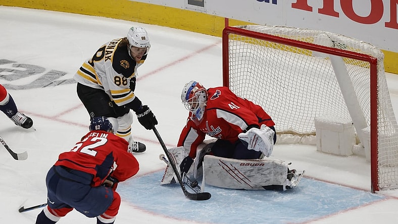 May 15, 2021; Washington, District of Columbia, USA; Washington Capitals goaltender Vitek Vanecek (41) makes a save on Boston Bruins right wing David Pastrnak (88) in the first period in game one of the first round of the 2021 Stanley Cup Playoffs at Capital One Arena. Mandatory Credit: Geoff Burke-USA TODAY Sports