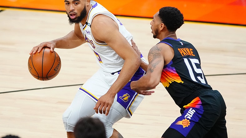 May 23, 2021; Phoenix, Arizona, USA; Los Angeles Lakers guard Talen Horton-Tucker (5) against Phoenix Suns guard Cameron Payne (15) during game one in the first round of the 2021 NBA Playoffs. at Phoenix Suns Arena. Mandatory Credit: Mark J. Rebilas-USA TODAY Sports