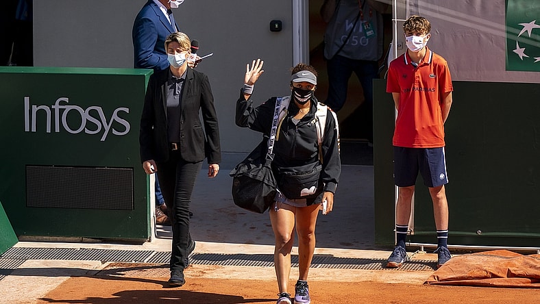 May 30, 2021; Paris, France; Naomi Osaka (JPN) enters the court for her match against Patricia Maria Tig (ROU) at Roland Garros Stadium. Mandatory Credit: Susan Mullane-USA TODAY Sports