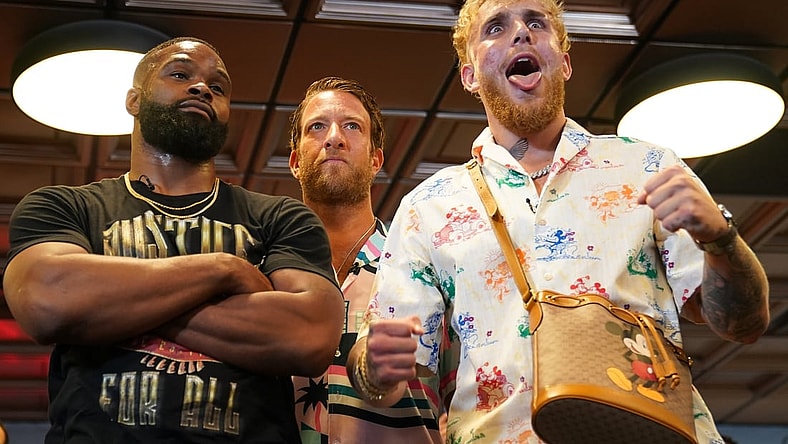 Jun 3, 2021; Miami Beach, Florida, USA; Professional MMA fighter Tyron Woodley and YouTube star Jake Paul face off in front of Bar Stool Sports founder Dave Portnoy at World Famous 5th St. Gym. Mandatory Credit: Jasen Vinlove-USA TODAY Sports