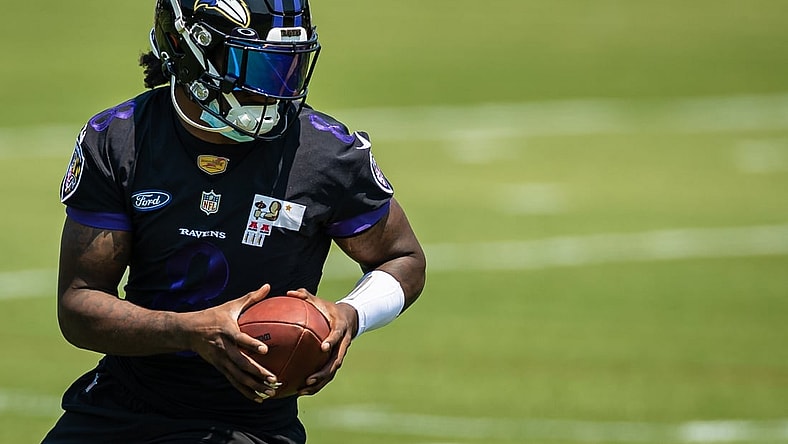 May 26, 2021; Owings Mills, Maryland, USA; Baltimore Ravens quarterback Lamar Jackson (8) in action during an OTA at Under Armour Performance Center. Mandatory Credit: Scott Taetsch-USA TODAY Sports