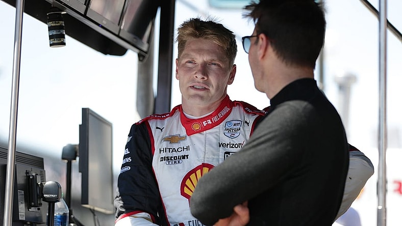 Team Penske drivers Josef Newgarden (2)  and Will Power (12) talk Sunday, May 30, 2021, after the 105th running of the Indianapolis 500 at Indianapolis Motor Speedway.