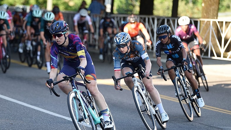 Cyclists round a corner during the women's 2021 USA Cycling Pro Criterium National Championships in downtown Knoxville Friday, June 18, 2021.

Usacycling0618 0325