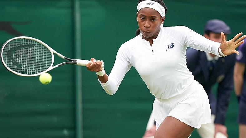 Jun 29, 2021; London, United Kingdom;  Coco Gauff (USA) in action Francesca Jones (GBR) in first round ladies singles on No. 2 court at All England Lawn Tennis and Croquet Club. Mandatory Credit: Peter van den Berg-USA TODAY Sports